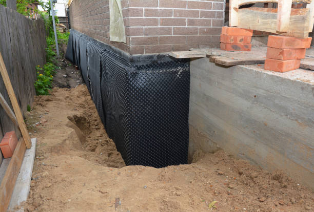 SJ Waterproofing Pros technician performing targeted Wet Basement Repair assessment in Silver Lake, IN